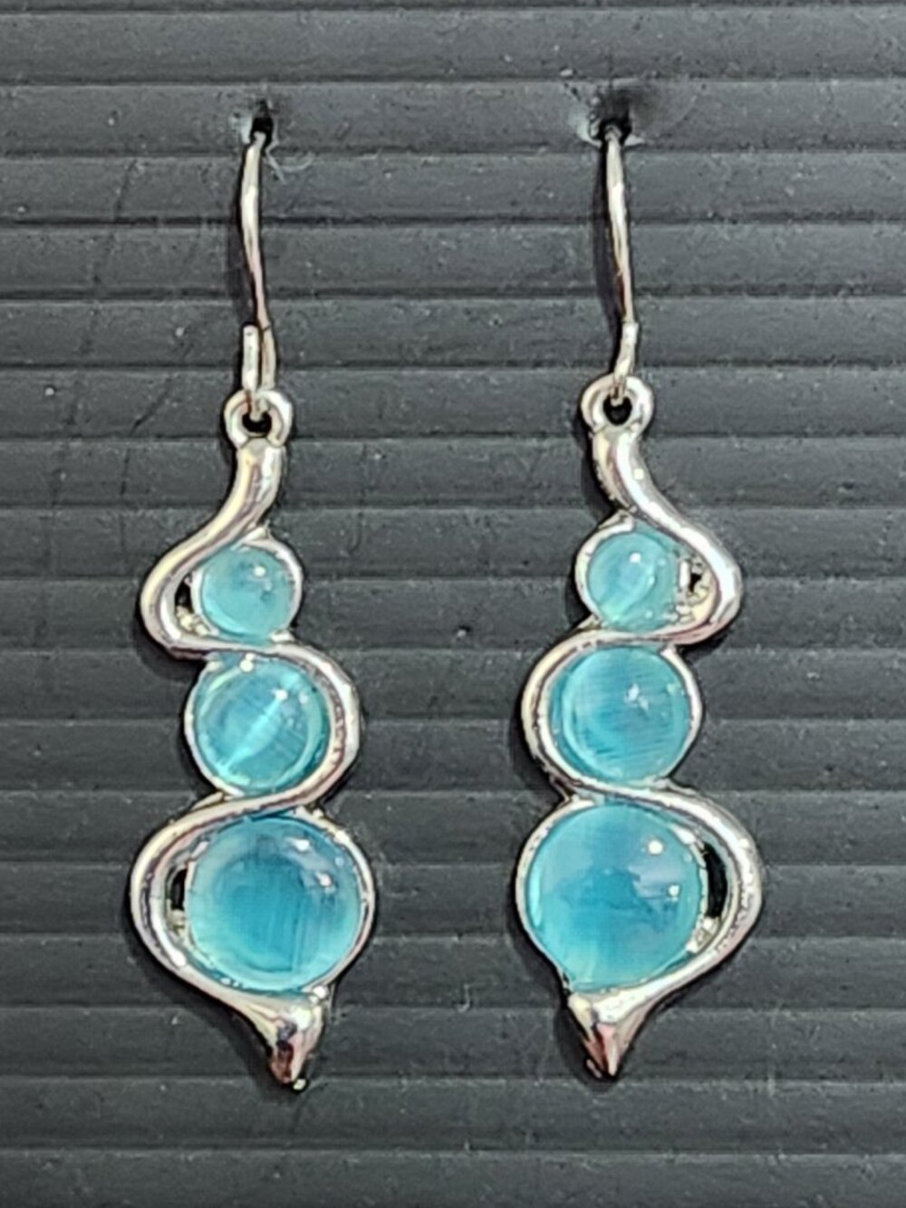 Aqua Blue Cat's Eye Glass Silver Tone Swirl Dangle Earrings
